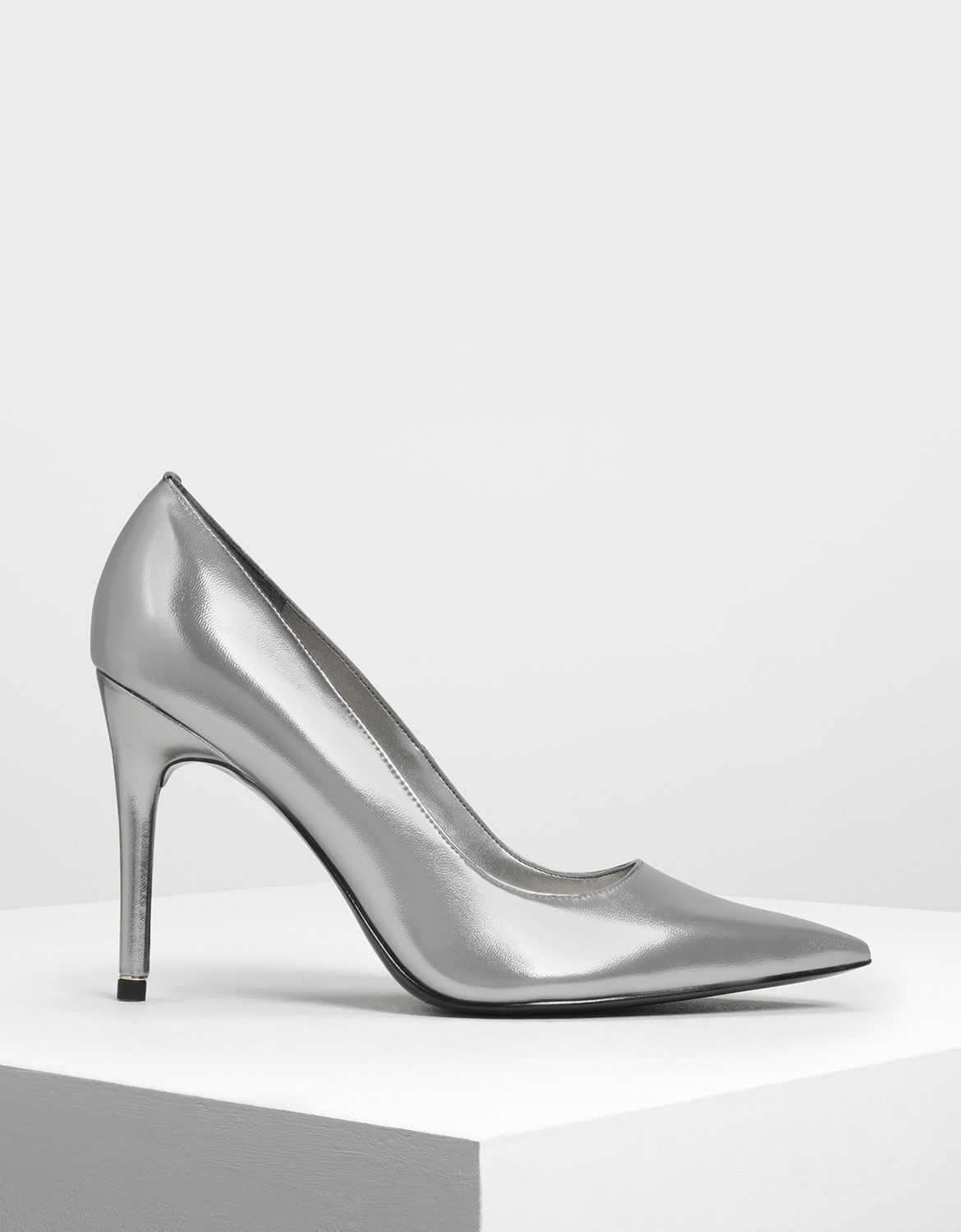 silver pointed toe pumps