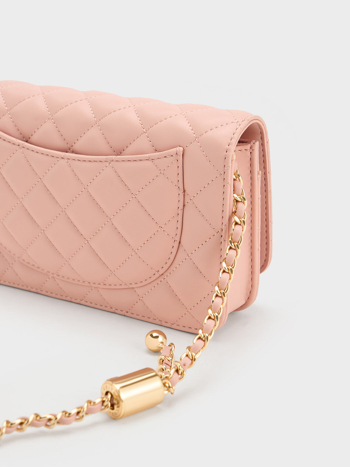 Pink Cressida Quilted Push Lock Clutch Charles And Keith Ie 