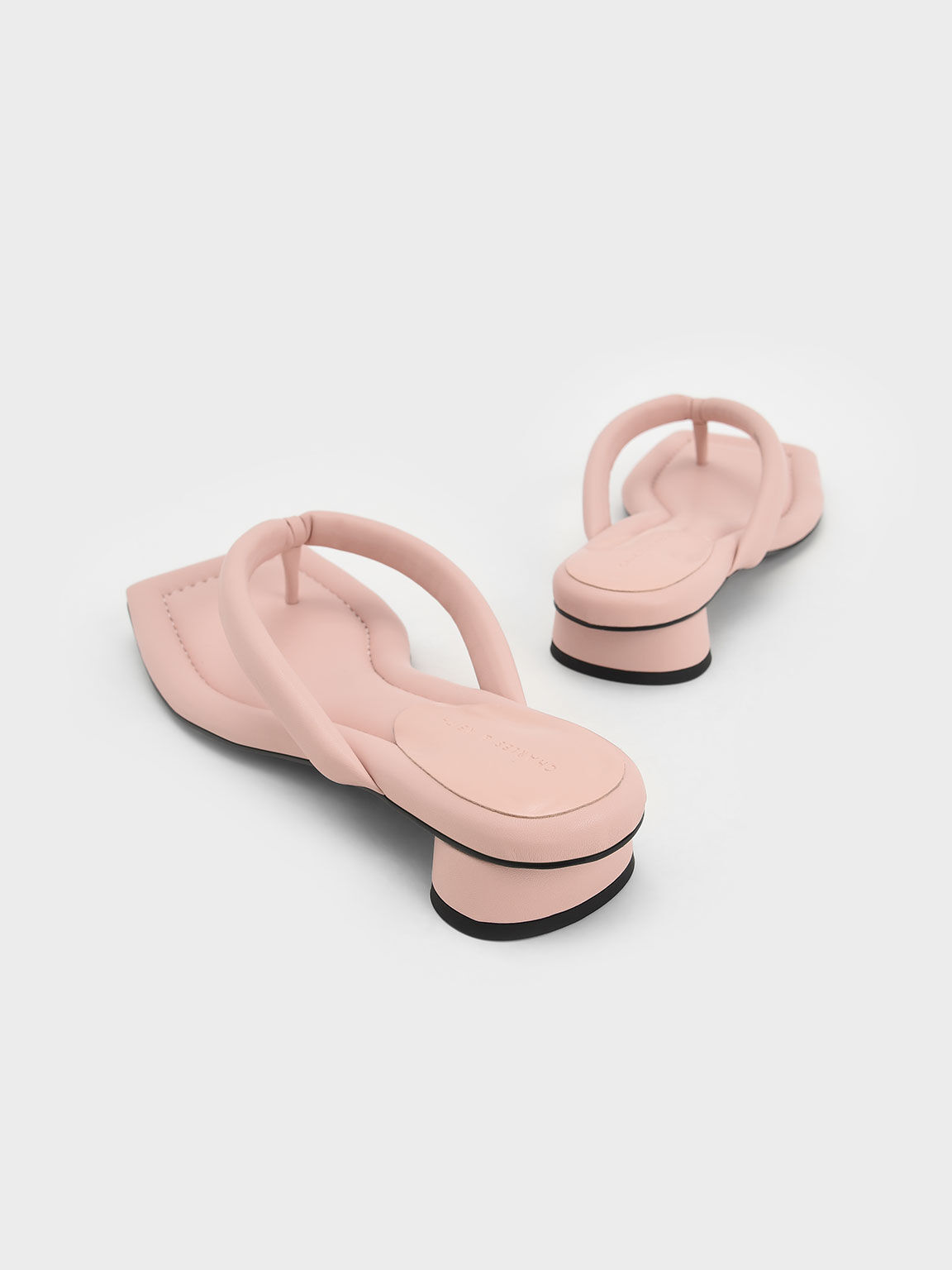CHARLES & KEITH - The thong sandal is enjoying a revival — our purple  asymmetric-toed version with puffy straps gives the iconic '90s shoe style  a contemporary update. Shop now:   #CharlesKeithCelebrates #