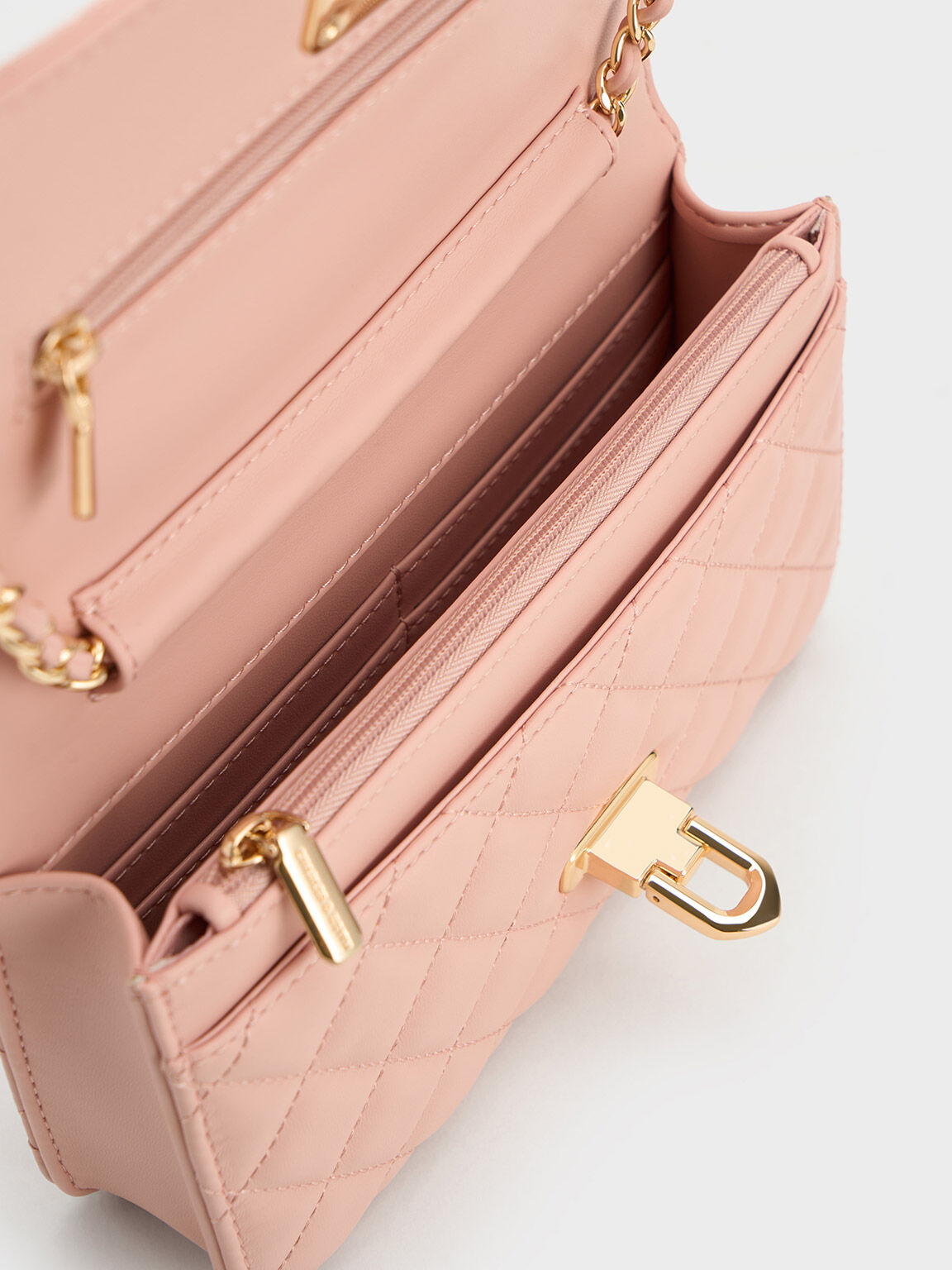 Pink Cressida Quilted Push Lock Clutch Charles And Keith Ie 