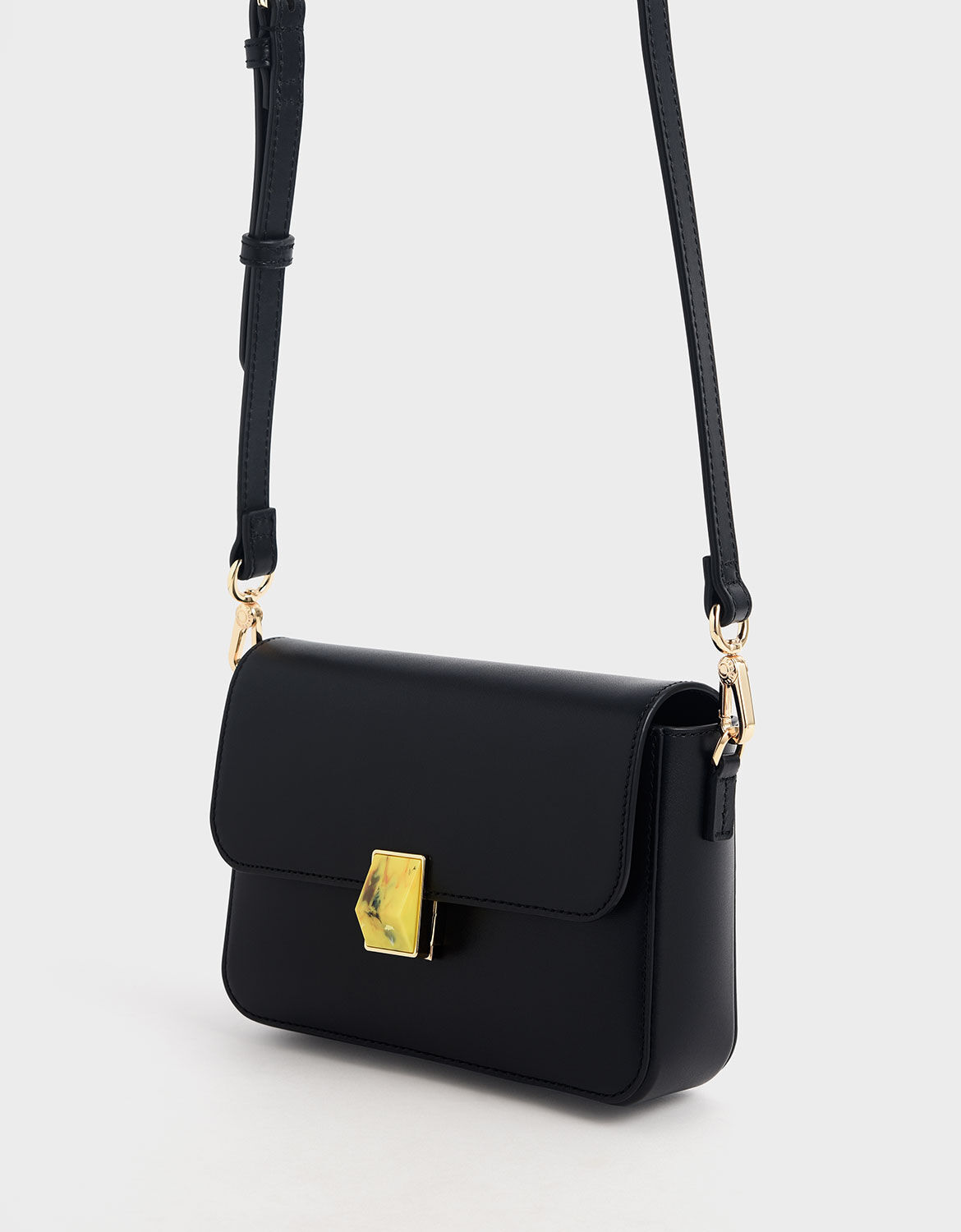 Black Leather Embellished Push-Lock Crossbody Bag | CHARLES & KEITH EU