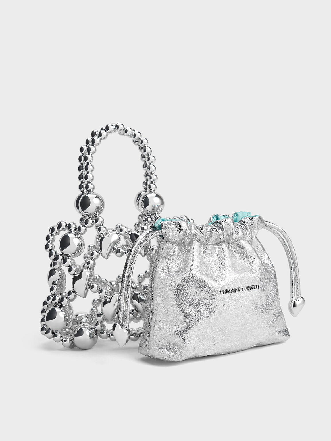 Coffret cadeau : sac à main avec poignéeen perles métallisées, Argent, hi-res