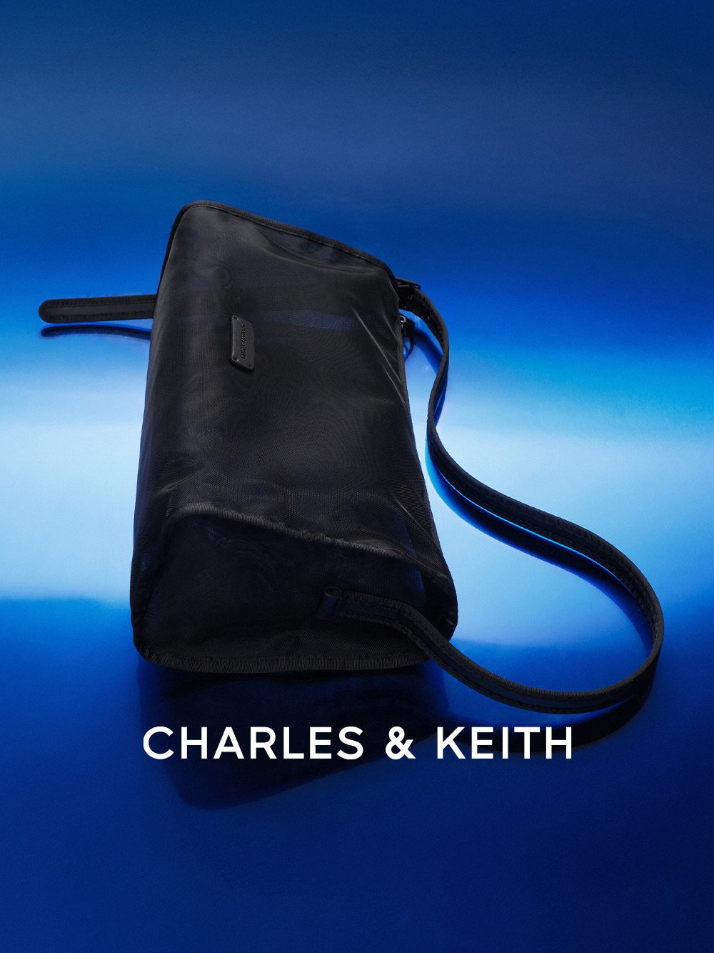 Mesh Elongated Shoulder Bag in black - CHARLES & KEITH