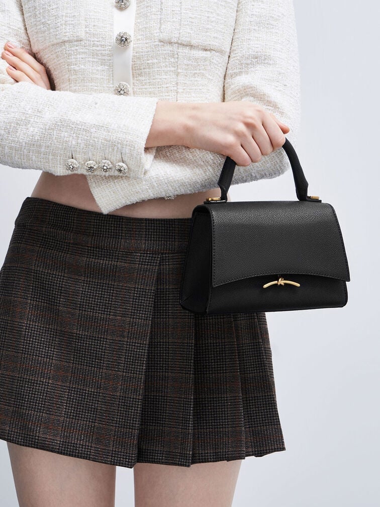 Sac à main à bouton-poussoir métallique Huxley en noir pour femme – CHARLES & KEITH