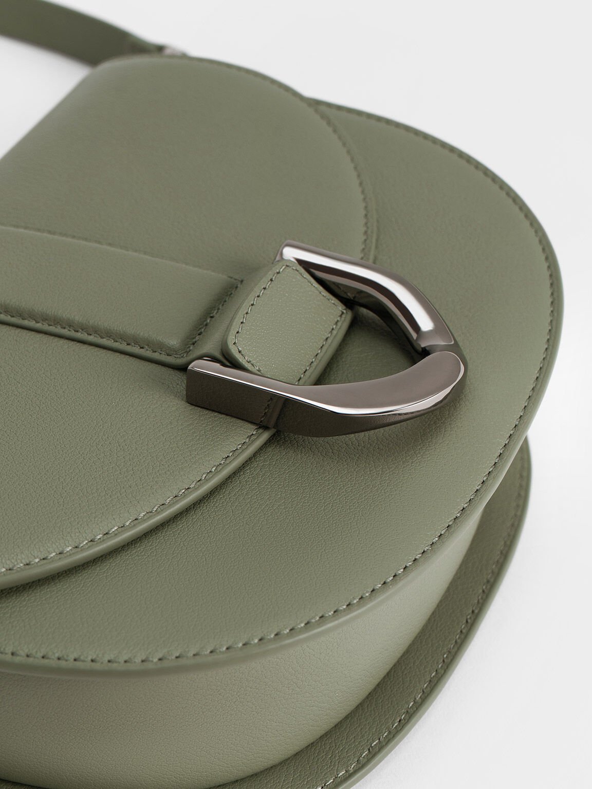 Women’s Gabine leather saddle bag in sage green - CHARLES & KEITH