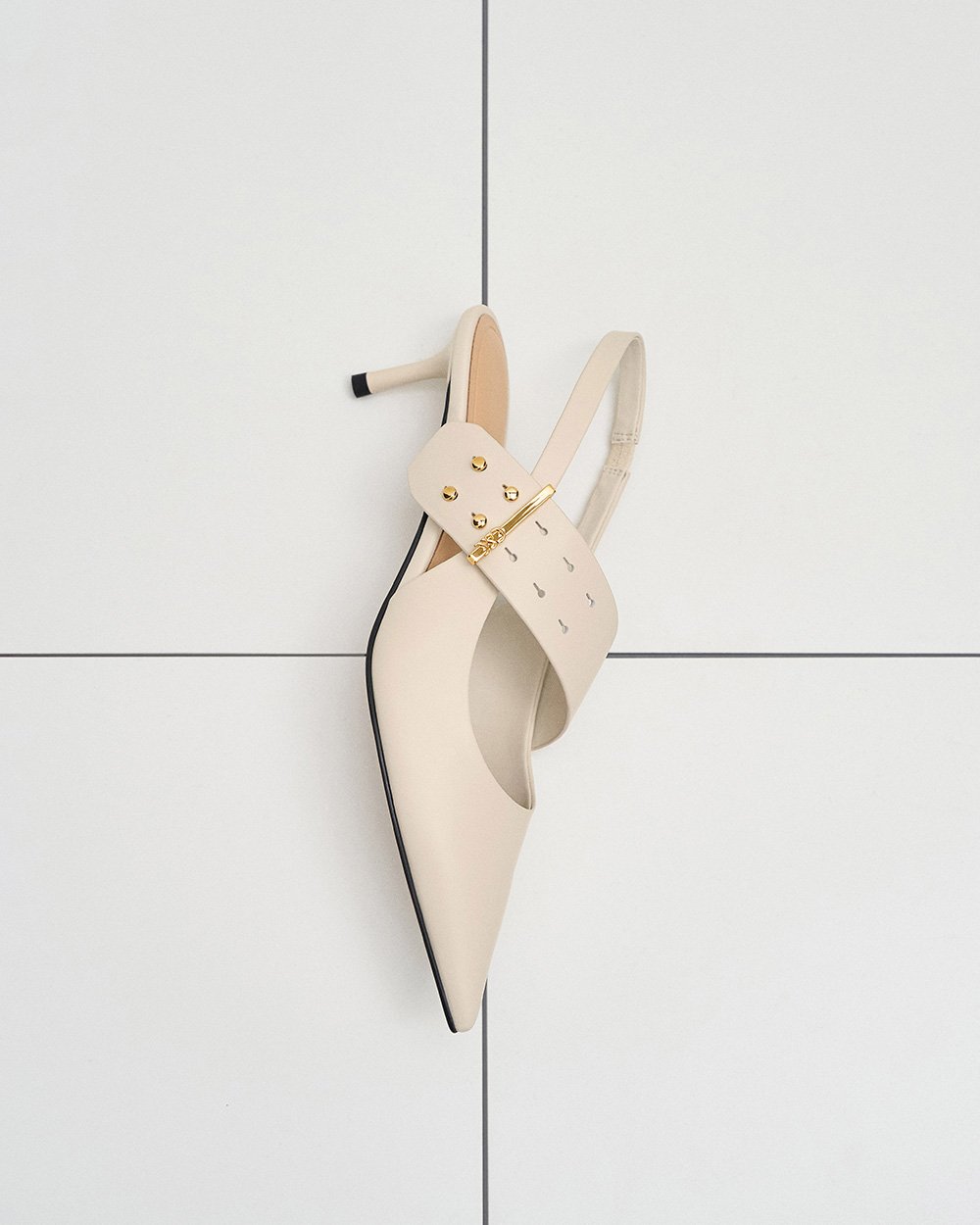 Women’s leather asymmetric-strap slingback Mary Jane pumps in white (close up) – CHARLES & KEITH