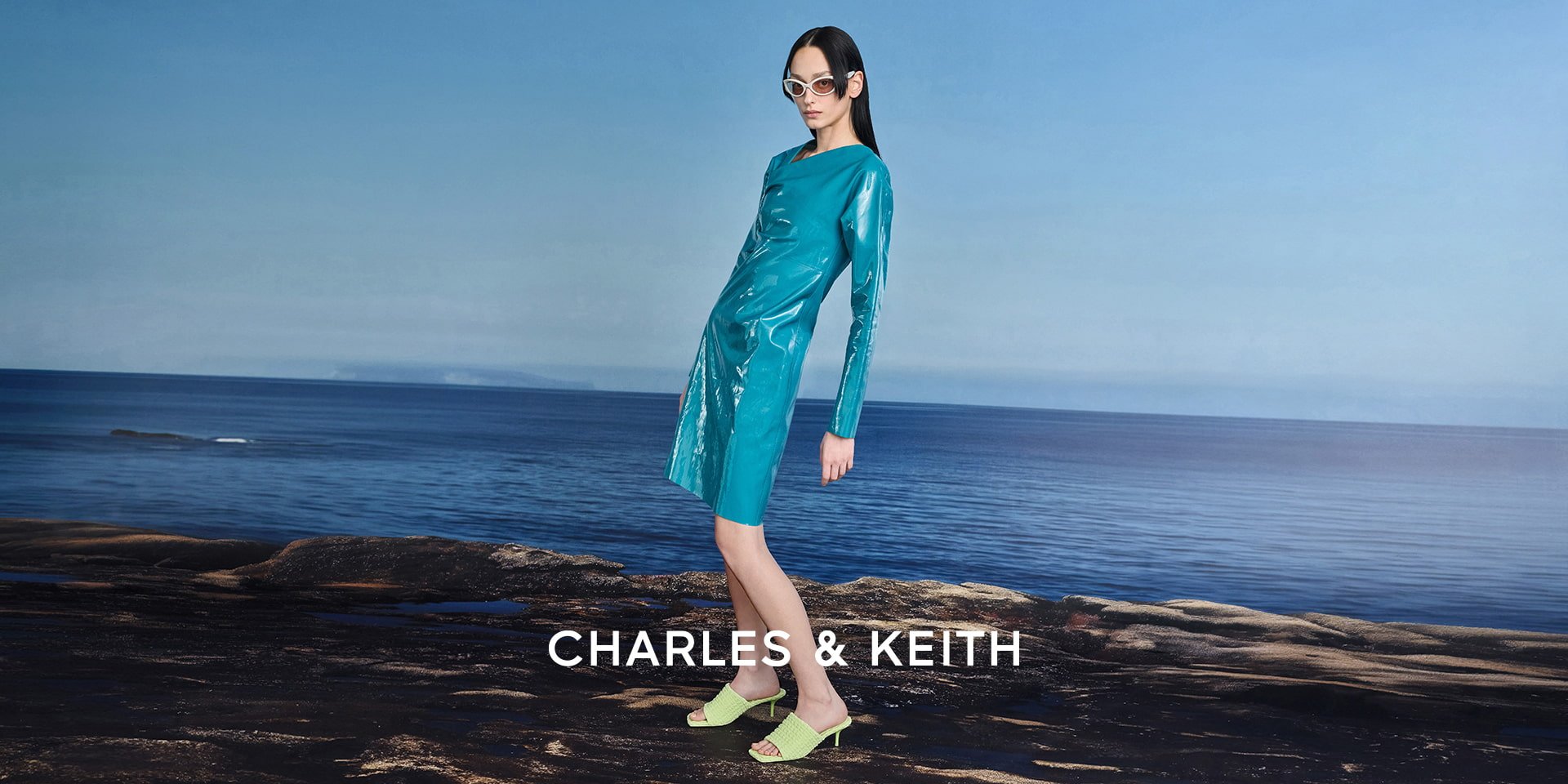 Loren Textured Kitten-Heel Mules in light green, Eden Oval Sports Sunglasses in chalk - CHARLES & KEITH