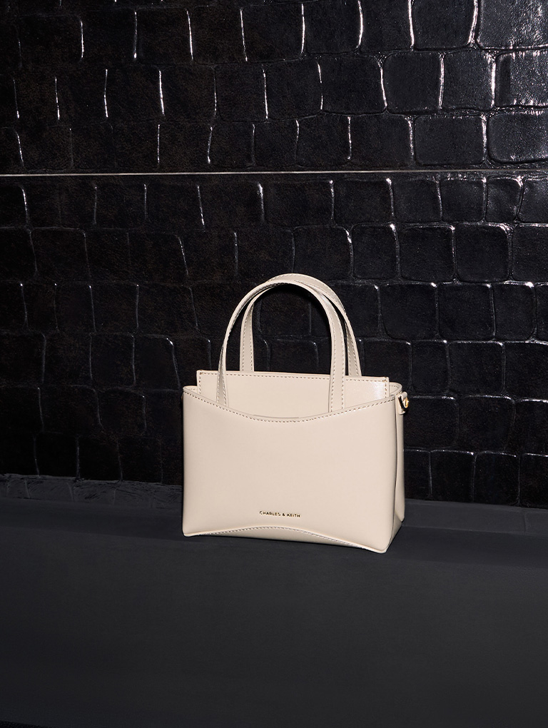 Mini Sybill Tote Bag in oat – CHARLES & KEITH