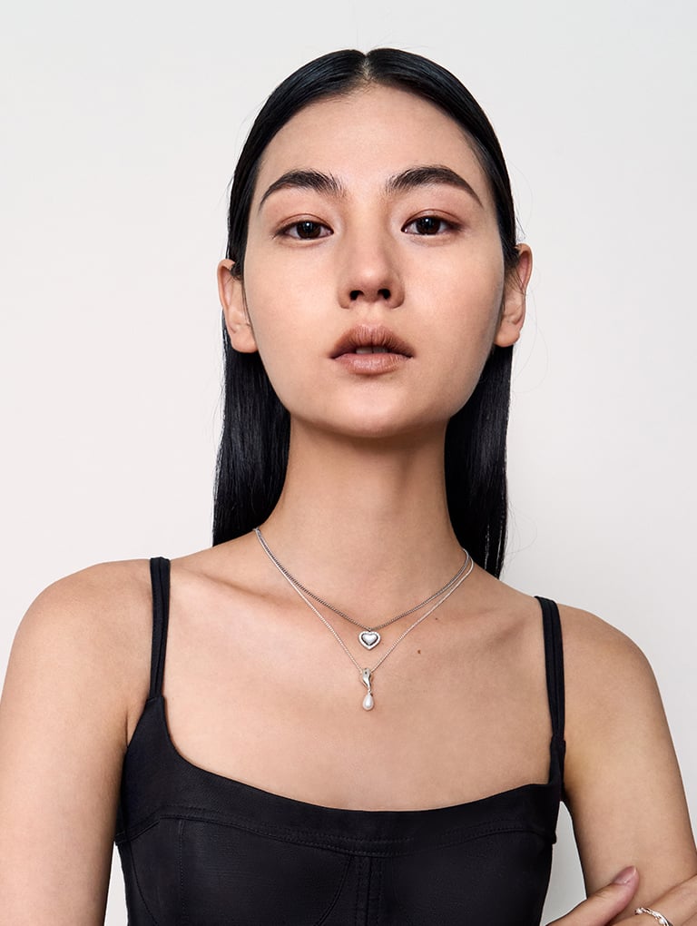 Women’s Annalise crystal heart-stone necklace and Corrine teardrop pearl necklace – CHARLES & KEITH