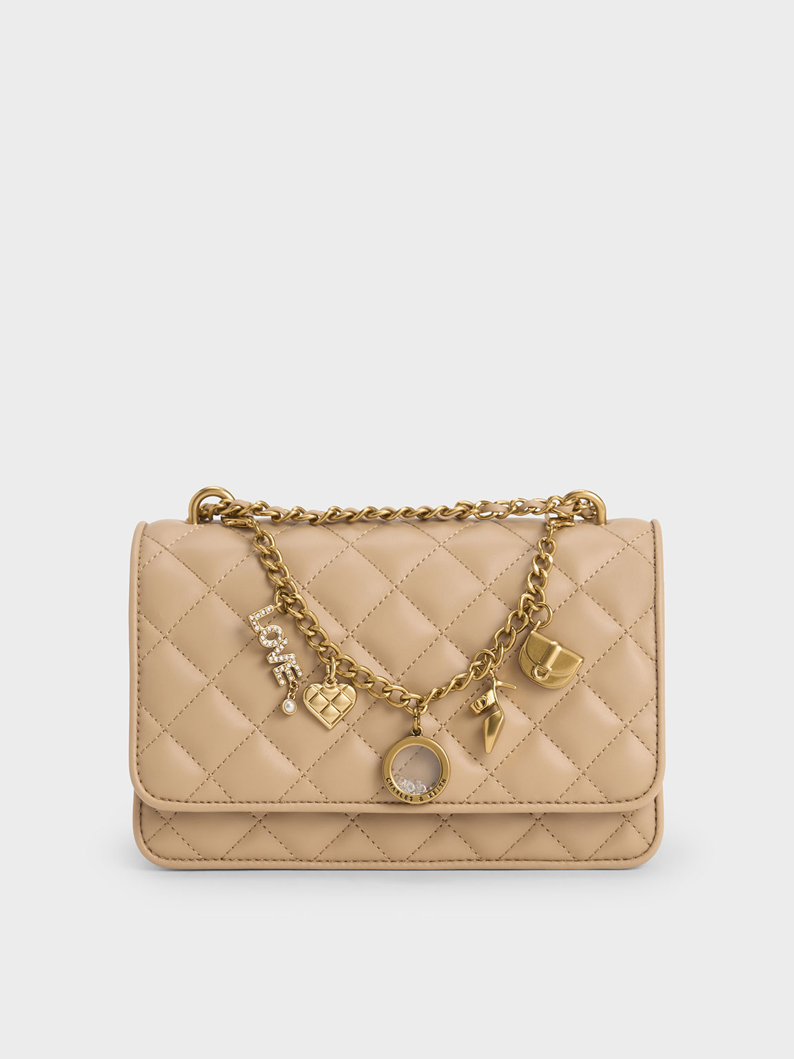 Gesteppte Clutch mit Charm Anhanger in Nude CHARLES KEITH DE